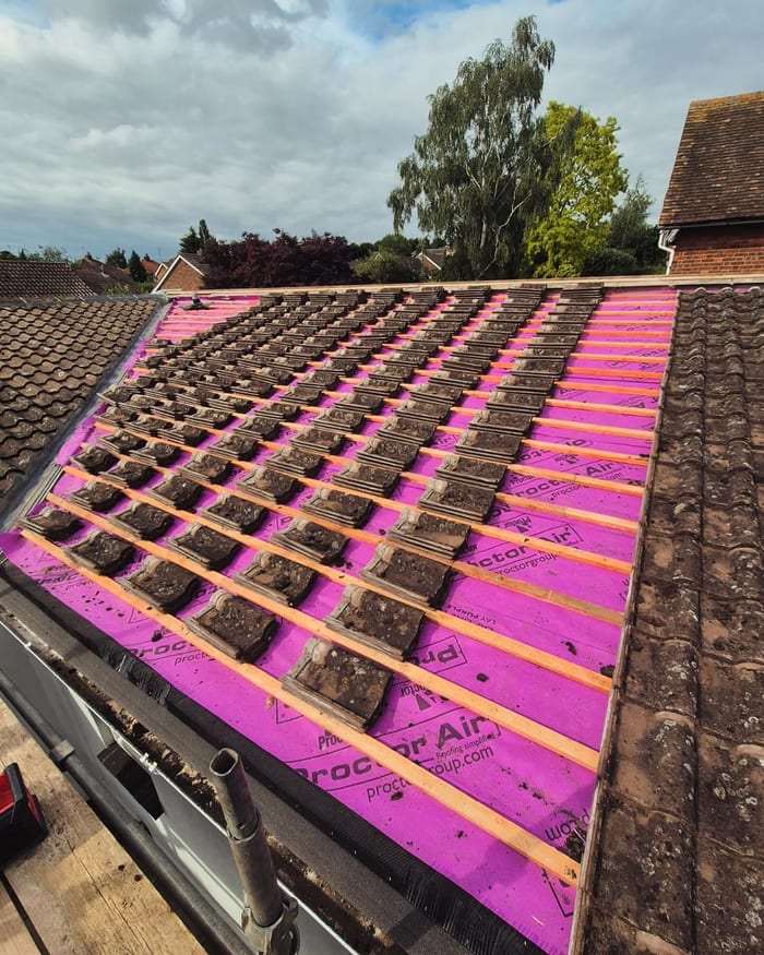 Roof restoration with tiles, battens and membrane